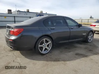 2012 BMW 7 Series 750i with VIN WBAKA8C58CDS99694, listed as a Copart auction lot 46828435 with 131,458 mi miles and Salvage title. Bid and sale history available at DreamBid. Image 3.