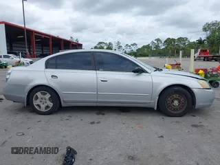 2004 Nissan Altima S with VIN 1N4AL11D04C130857, listed as a IAAI auction lot 41661519 with 147,518 mi miles. Bid and sale history available at carsss.com. Image 14.