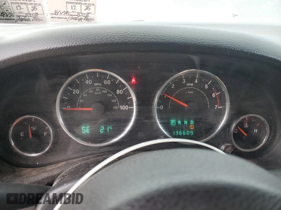 2011 Jeep Wrangler Sport z VIN 1J4GA2D16BL511735, wystawiony jako Copart lot #63292705 z przebiegiem 136 609 mil mil oraz Szkoda całkowita • Salvage title. Historia ofert i sprzedaży dostępna na DreamBid. Obrazek 9.