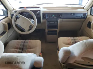 1991 Dodge Caravan z VIN 1B4GD54R1MX553940, wystawiony jako Copart lot #59332594 z przebiegiem 110 858 mil mil oraz Szkody całkowita. Historia ofert i sprzedaży dostępna na DreamBid. Obrazek 8.