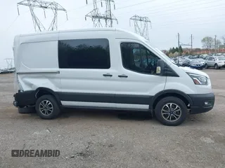 2023 Ford Transit Cargo with VIN 1FTBR1CG5PKA86059, listed as a IAAI auction lot 41951060 with 56,323 mi miles. Bid and sale history available at carsss.com. Image 14.