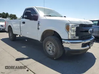 2019 Ford F-250 XL with VIN 1FTBF2A61KED12145, listed as a Copart auction lot 63007095 with 107,594 mi miles and Salvage title. Bid and sale history available at DreamBid. Image 4.