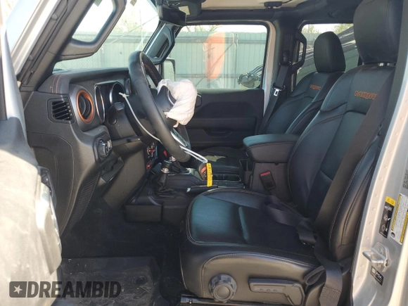2023 Jeep Gladiator Mojave with VIN 1C6JJTEGXPL547222, listed as a Copart auction lot 52143545 with 28,586 mi miles and Salvage title. Bid and sale history available at DreamBid. Image 7.