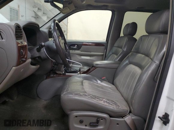 2003 GMC Envoy SLT с VIN 1GKET16S736148082, выставлен на аукционе Copart как лот 53889665 с пробегом 179 774 миль миль и Чистый • Clean title. История ставок и продаж доступна на DreamBid. Изображение 7.