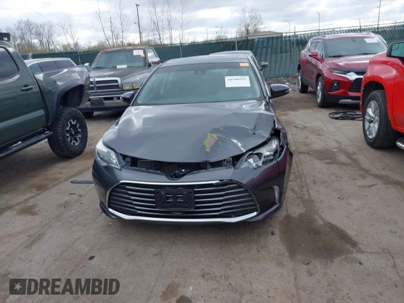 2018 Toyota Avalon XLE with VIN 4T1BK1EB9JU275097, listed as a IAAI auction lot 41940585 with 119,854 mi miles and . Bid and sale history available at DreamBid. Image 12.