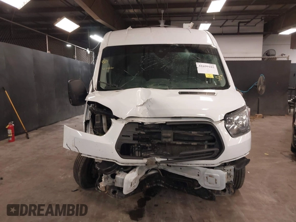 2016 Ford Transit z VIN 1FTBW2CGXGKA81714, wystawiony jako IAAI lot #41699102 z przebiegiem 179 402 mil mil oraz . Historia ofert i sprzedaży dostępna na DreamBid. Obrazek 13.