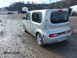 2009 Nissan Cube SL z VIN JN8AZ28R99T111414, wystawiony jako IAAI lot #41542454 z przebiegiem 117 297 mil mil oraz . Historia ofert i sprzedaży dostępna na DreamBid. Obrazek 3.