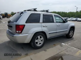 2007 Jeep Grand Cherokee Laredo with VIN 1J8GS48K77C575560, listed as a Copart auction lot 65741354 with 150,062 mi miles and Salvage Title. Bid and sale history available at carsss.com. Image 3.