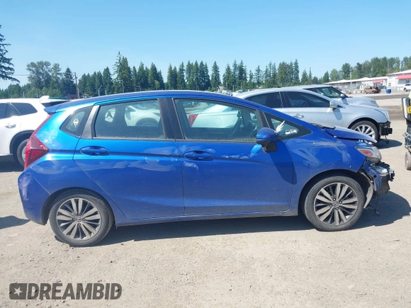 2015 Honda Fit EX-L z VIN 3HGGK5H85FM745849, wystawiony jako IAAI lot #42443790 z przebiegiem 93 488 mil mil oraz . Historia ofert i sprzedaży dostępna na DreamBid. Obrazek 14.