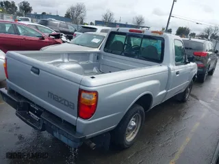 2003 Mazda B-Series 2WD Truck SX with VIN 4F4YR12D03TM16560, listed as a IAAI auction lot 41771702 with 94,027 mi miles. Bid and sale history available at carsss.com. Image 4.
