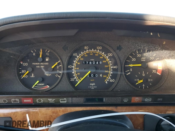 1989 Mercedes-Benz 560 with VIN WDBCA39D1KA429080, listed as a Copart auction lot 75631614 with 178,048 mi miles and Salvage Title. Bid and sale history available at DreamBid. Image 9.