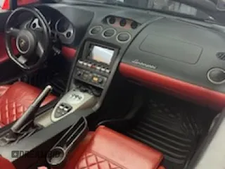 2013 Lamborghini Gallardo z VIN ZHWGU6BZ7DLA12511, wystawiony jako Copart lot #85780924 z przebiegiem 35 386 mil mil oraz Szkody całkowita. Historia ofert i sprzedaży dostępna na DreamBid. Obrazek 8.