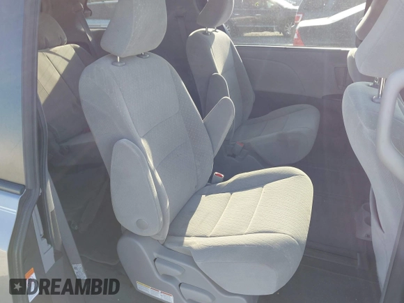 2018 Toyota Sienna LE with VIN 5TDJZ3DC3JS190746, listed as a IAAI auction lot 42161562 with 180,000 mi miles and . Bid and sale history available at DreamBid. Image 8.