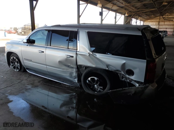 2018 Chevrolet Suburban Premier with VIN 1GNSCJKC7JR104888, listed as a Copart auction lot 68027604 with 69,632 mi miles and Salvage Title. Bid and sale history available at carsss.com. Image 2.