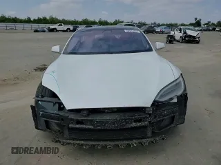 2018 Tesla Model S 75D z VIN 5YJSA1E27JF247900, wystawiony jako Copart lot #52014375 z przebiegiem 106 670 mil mil oraz Szkoda całkowita • Salvage title. Historia ofert i sprzedaży dostępna na DreamBid. Obrazek 11.