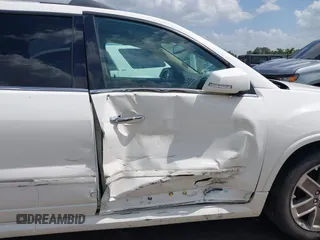2012 GMC Acadia Denali with VIN 1GKKVTEDXCJ210342, listed as a IAAI auction lot 42549900 with 241,440 mi miles and . Bid and sale history available at DreamBid. Image 6.