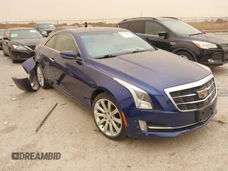 2015 Cadillac ATS Luxury AWD z VIN 1G6AH1RX6F0120173, wystawiony jako IAAI lot #41701867 z przebiegiem 70 142 mil mil oraz . Historia ofert i sprzedaży dostępna na DreamBid. Obrazek 1.