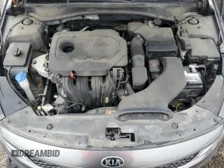 2016 Kia Optima LX z VIN 5XXGT4L3XGG104667, wystawiony jako Copart lot #53968815 z przebiegiem 82 417 mil mil oraz Szkoda całkowita • Salvage title. Historia ofert i sprzedaży dostępna na DreamBid. Obrazek 11.