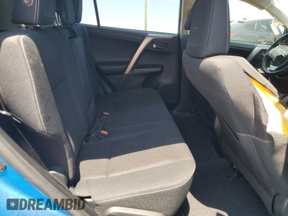 2016 Toyota RAV4 XLE with VIN JTMRFREV2GJ058808, listed as a Copart auction lot 61449135 with 73,985 mi miles and Salvage title. Bid and sale history available at DreamBid. Image 11.