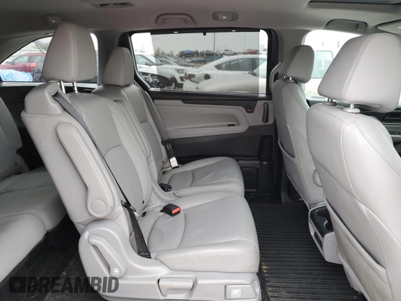 2018 Honda Odyssey EX-L with VIN 5FNRL6H78JB091153, listed as a Copart auction lot 52743715 with 69,849 mi miles and Salvage Title. Bid and sale history available at DreamBid. Image 11.