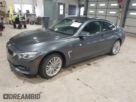 2014 BMW 4 Series 428i xDrive with VIN WBA3N9C56EF721564, listed as a IAAI auction lot 41737409 with 42,052 mi miles and . Bid and sale history available at DreamBid. Image 2.