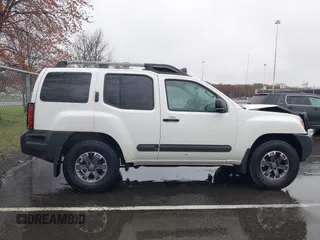 2014 Nissan Xterra X with VIN 5N1AN0NW4EN814113, listed as a IAAI auction lot 41969236 with 111,857 mi miles and . Bid and sale history available at DreamBid. Image 13.