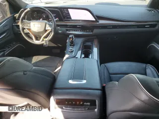 2023 Cadillac Escalade RWD Premium Luxury z VIN 1GYS3BKL4PR395559, wystawiony jako Copart lot #48347285 z przebiegiem 3 818 mil mil oraz Szkoda całkowita • Salvage title. Historia ofert i sprzedaży dostępna na DreamBid. Obrazek 8.