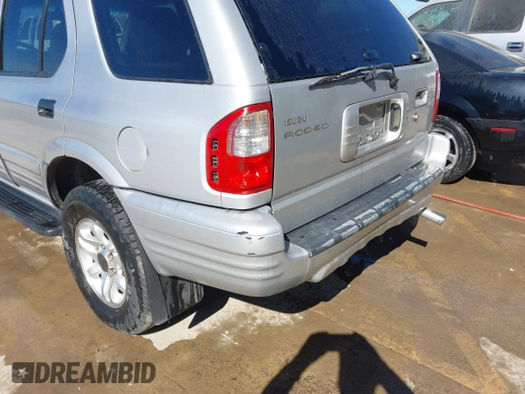 2002 Isuzu Rodeo S with VIN 4S2CK58WX24321556, listed as a IAAI auction lot 41405981 with 172,590 mi miles and . Bid and sale history available at DreamBid. Image 6.