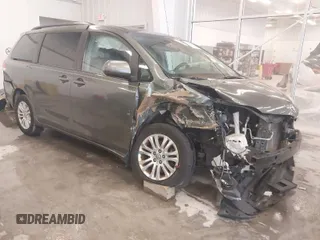 2014 Toyota Sienna XLE with VIN 5TDYK3DC2ES476581, listed as a IAAI auction lot 41509838 with 150,449 mi miles. Bid and sale history available at carsss.com. Image 1.
