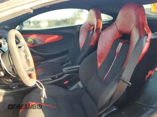 2017 McLaren 570S z VIN SBM13DAAXHW003255, wystawiony jako Copart lot #84219454 z przebiegiem Nie podano mil oraz Szkody całkowita. Historia ofert i sprzedaży dostępna na DreamBid. Obrazek 10.