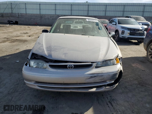 1999 Toyota Corolla VE with VIN 2T1BR12E2XC249817, listed as a Copart auction lot 86552414 with Not provided miles and Salvage title. Bid and sale history available at DreamBid. Image 5.