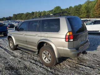 2002 Mitsubishi Montero Limited z VIN JA4LS41R32J066917, wystawiony jako Copart lot #71118894 z przebiegiem 185 475 mil mil oraz Szkody całkowita. Historia ofert i sprzedaży dostępna na DreamBid. Obrazek 2.