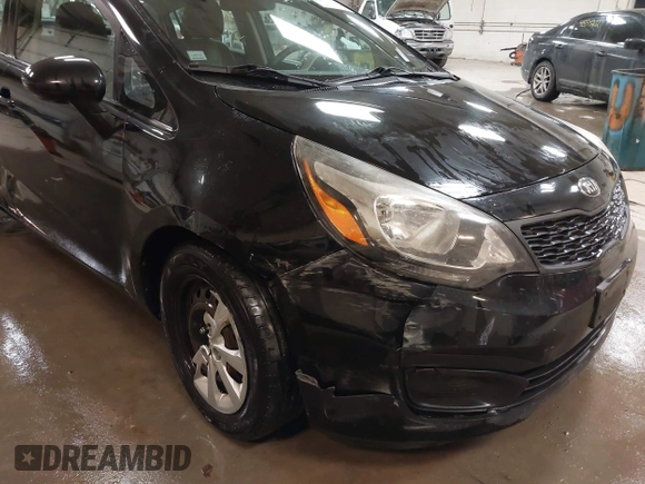 2014 Kia Rio LX with VIN KNADM4A31E6404206, listed as a IAAI auction lot 41543090 with 70,563 mi miles and . Bid and sale history available at DreamBid. Image 6.