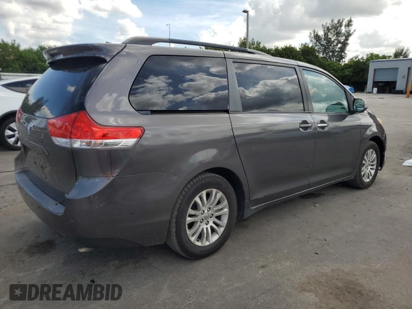 2013 Toyota Sienna XLE AAS with VIN 5TDYK3DC7DS389872, listed as a Copart auction lot 66072995 with 95,797 mi miles and Clean title. Bid and sale history available at DreamBid. Image 3.