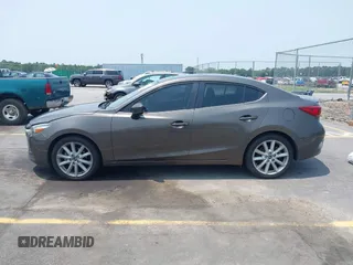 2017 Mazda 3 Touring with VIN 3MZBN1V74HM142735, listed as a IAAI auction lot 42395462 with 137,543 mi miles and . Bid and sale history available at DreamBid. Image 14.