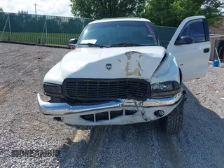2000 Dodge Dakota z VIN 1B7GL22X1YS740359, wystawiony jako IAAI lot #42430964 z przebiegiem 213 435 mil mil oraz . Historia ofert i sprzedaży dostępna na DreamBid. Obrazek 6.