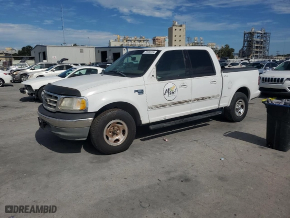 2001 Ford F-150 SuperCrew XLT with VIN 1FTRW07W41KE02772, listed as a Copart auction lot 73586724 with 0 mi miles and Salvage Title. Bid and sale history available at carsss.com. Image 1.