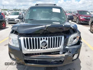 2011 Mercury Mariner Premier with VIN 4M2CN8HGXBKJ07489, listed as a IAAI auction lot 42574942 with 163,786 mi miles and . Bid and sale history available at DreamBid. Image 12.