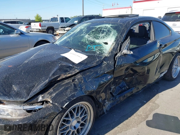 2014 BMW 2 Series M235i with VIN WBA1J7C50EVX33903, listed as a IAAI auction lot 40207684 with 81,766 mi miles and . Bid and sale history available at DreamBid. Image 6.