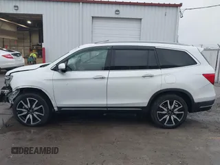 2021 Honda Pilot Touring 8-Passenger z VIN 5FNYF6H90MB031795, wystawiony jako IAAI lot #41207263 z przebiegiem 56 367 mil mil oraz . Historia ofert i sprzedaży dostępna na DreamBid. Obrazek 15.