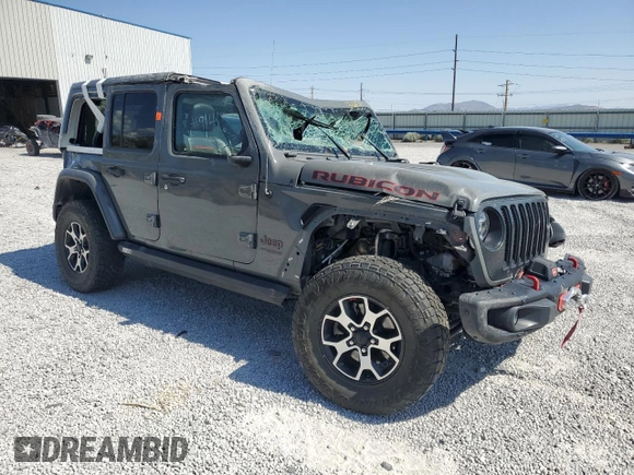 2020 Jeep Wrangler Unlimited Rubicon with VIN 1C4HJXFG4LW334160, listed as a Copart auction lot 59486435 with Not provided miles and Salvage title. Bid and sale history available at DreamBid. Image 4.
