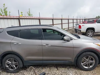2018 Hyundai Santa Fe 2.4L with VIN 5NMZU3LB1JH100507, listed as a IAAI auction lot 42182116 with 103,826 mi miles and . Bid and sale history available at DreamBid. Image 13.