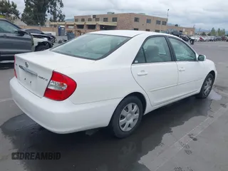 2004 Toyota Camry LE with VIN 4T1BE32K84U362436, listed as a IAAI auction lot 42134510 with 199,371 mi miles. Bid and sale history available at carsss.com. Image 4.