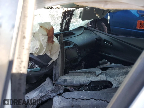 2021 Toyota Prius LE z VIN JTDL9MFU9M3022975, wystawiony jako Copart lot #53810615 z przebiegiem Nie podano mil oraz Nie do naprawy • Non repairable. Historia ofert i sprzedaży dostępna na DreamBid. Obrazek 8.