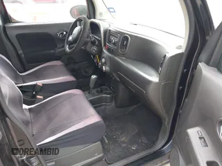 2012 Nissan Cube S z VIN JN8AZ2KR6CT254966, wystawiony jako IAAI lot #42419990 z przebiegiem 146 819 mil mil oraz . Historia ofert i sprzedaży dostępna na DreamBid. Obrazek 5.