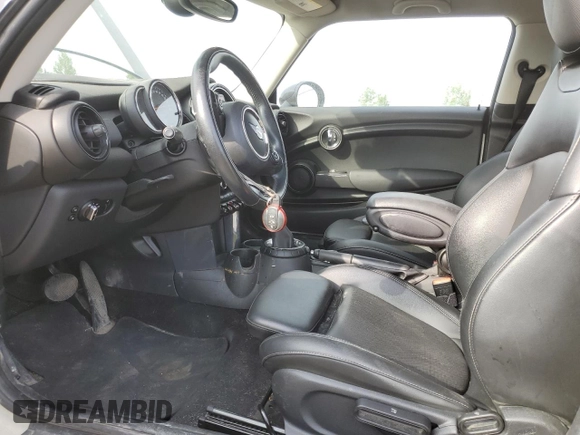2016 MINI Hardtop with VIN WMWXP5C5XG2D15482, listed as a Copart auction lot 59652125 with 99,066 mi miles and Salvage title. Bid and sale history available at DreamBid. Image 7.