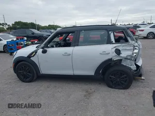 2015 MINI Countryman S z VIN WMWZC3C5XFWP53190, wystawiony jako IAAI lot #41273123 z przebiegiem 163 658 mil mil oraz . Historia ofert i sprzedaży dostępna na DreamBid. Obrazek 14.