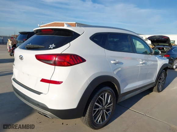 2020 Hyundai Tucson Sport with VIN KM8J33AL8LU251329, listed as a IAAI auction lot 41254246 with 61,626 mi miles. Bid and sale history available at carsss.com. Image 4.