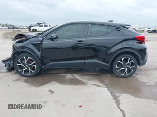 2020 Toyota C-HR LE z VIN JTNKHMBX1L1074377, wystawiony jako IAAI lot #42135672 z przebiegiem 88 846 mil mil oraz . Historia ofert i sprzedaży dostępna na DreamBid. Obrazek 14.