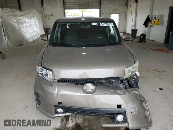 2012 Scion xB z VIN JTLZE4FE6C1145727, wystawiony jako Copart lot #54135915 z przebiegiem 111 652 mil mil oraz Szkody całkowita. Historia ofert i sprzedaży dostępna na DreamBid. Obrazek 5.